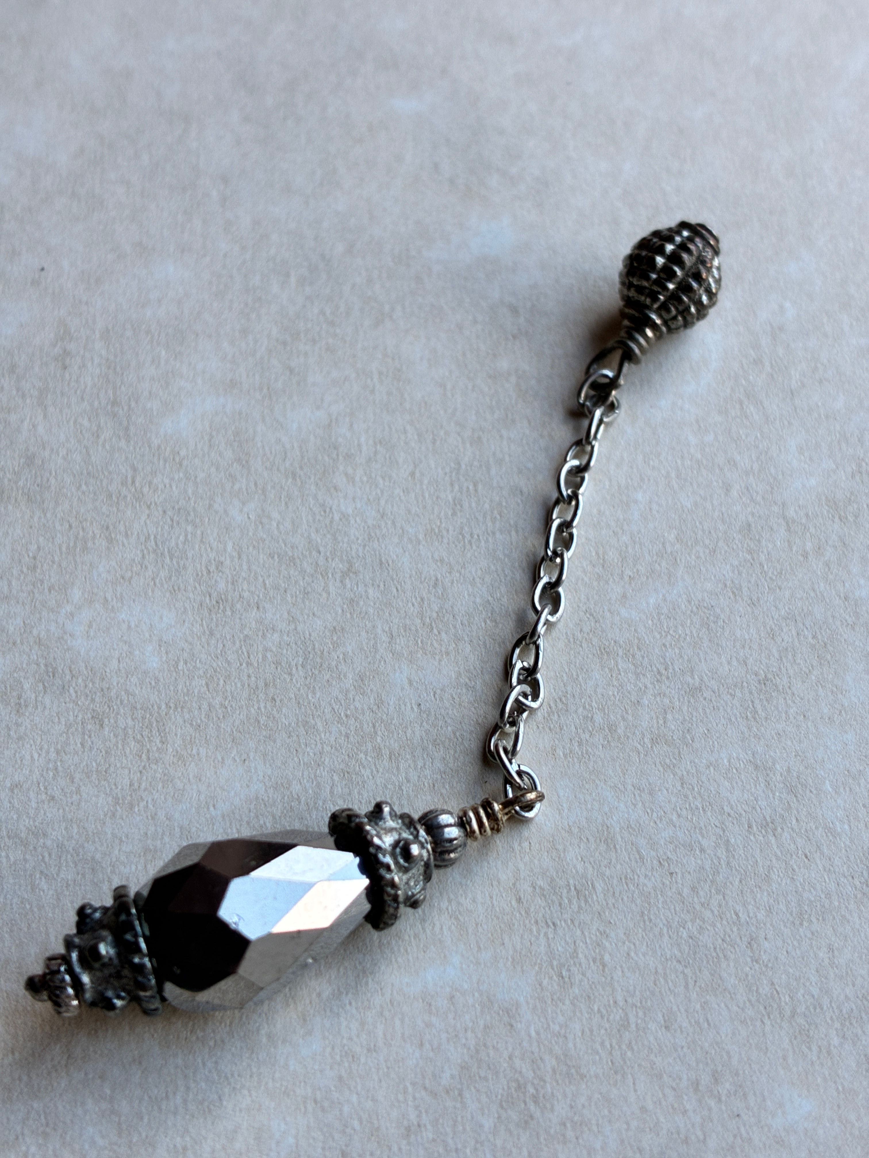 3  3/8" Faceted hematite pendulum
