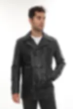 A man wearing a black leather jacket with snakeskin detail, front view (1) — By Kani.