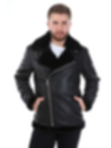 A man wearing a black shearling jacket.