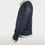 Thumbnail: A navy shearling jacket side view.