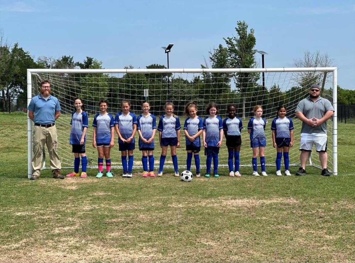 Youth soccer team in custom uniforms