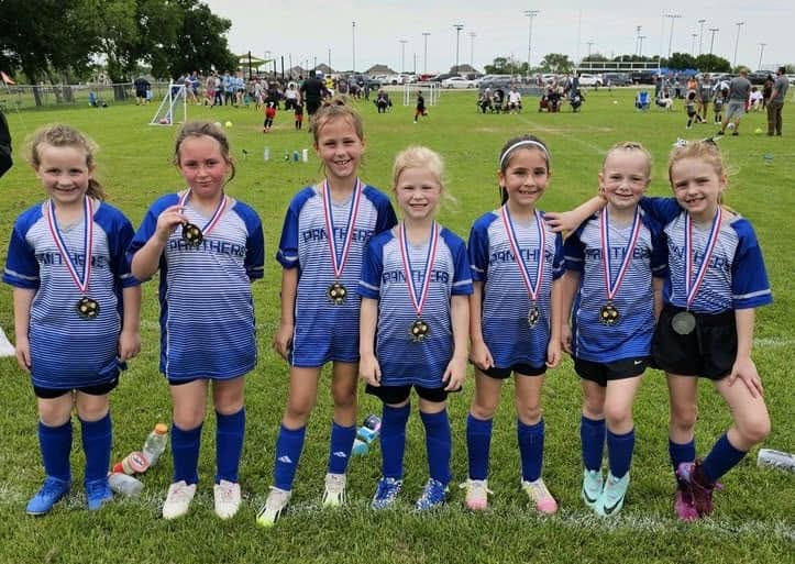 Youth soccer team in custom uniforms