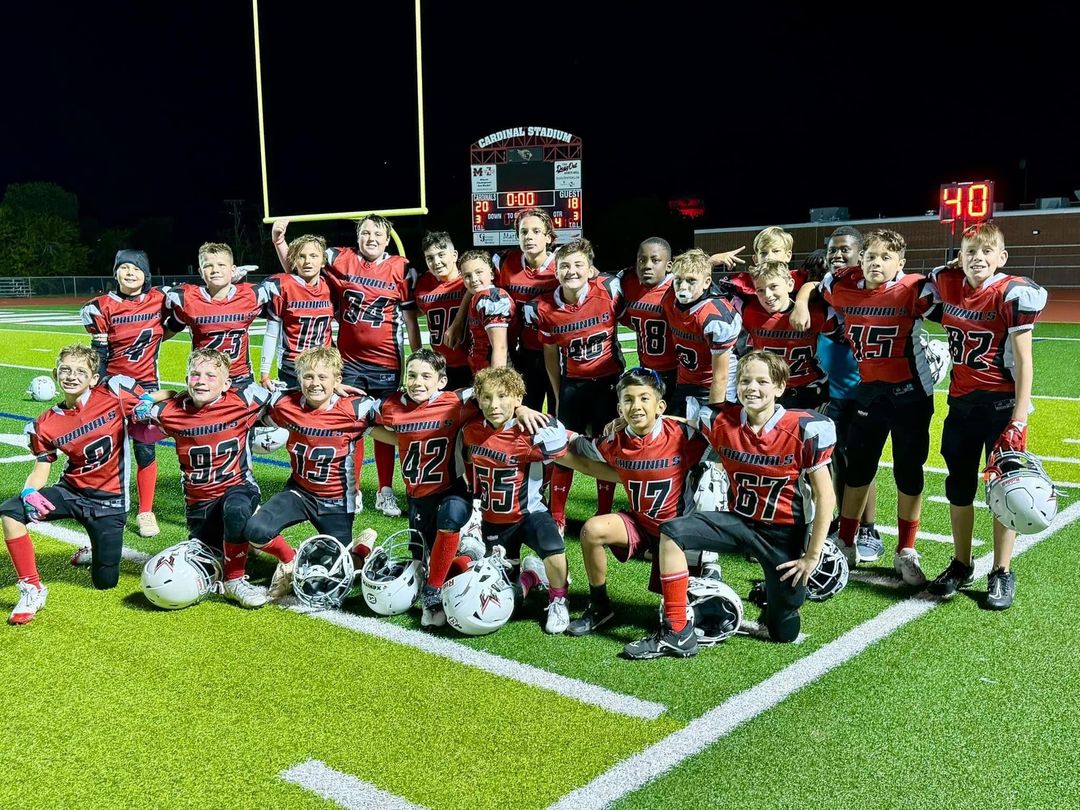 Youth football team in custom uniforms