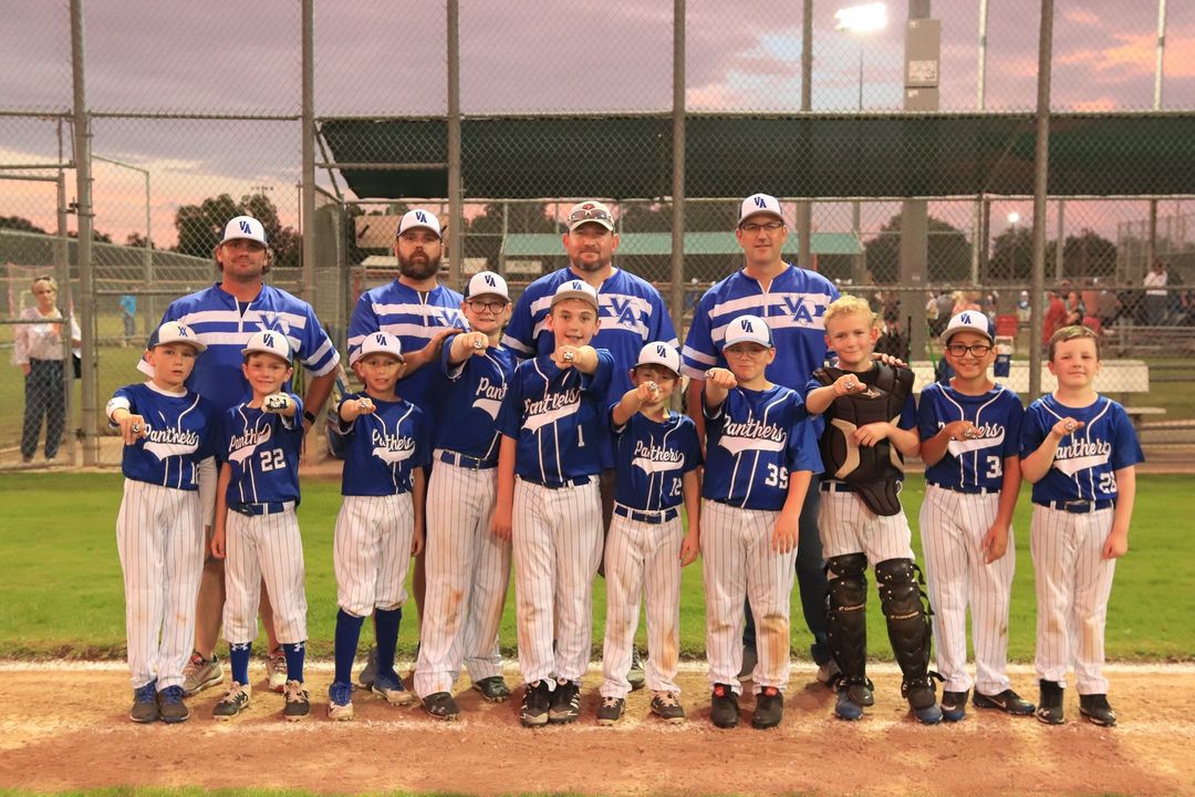 Youth baseball team in custom uniforms