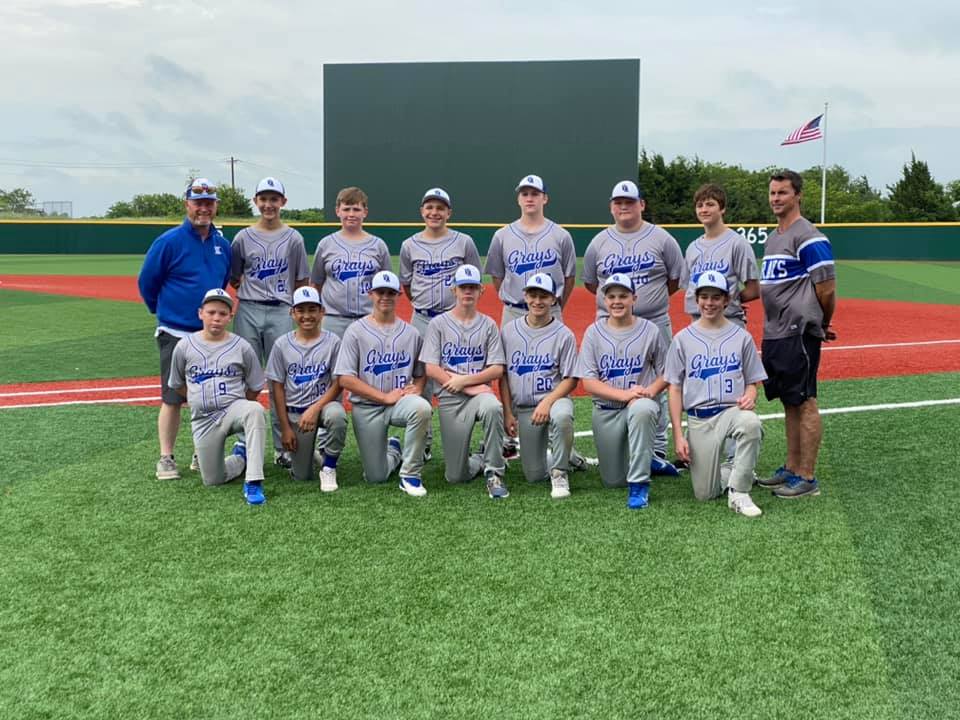 Baseball team in gray custom uniforms
