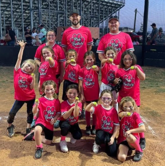 Girls youth team in custom pink uniforms