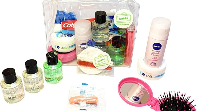 Selection of travel sized toiletries and hygiene products