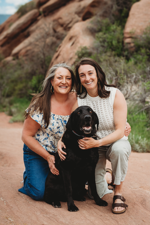 Family photo with black lab