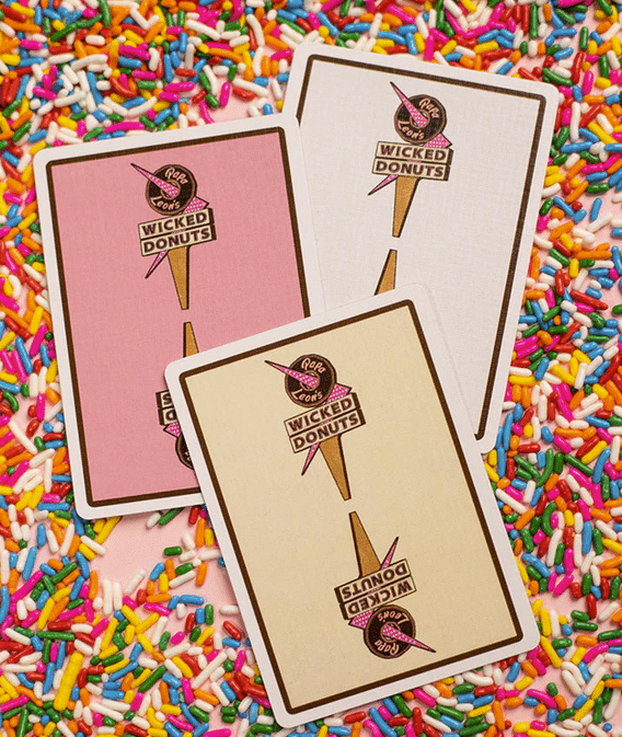Thumbnail: Papa Leon's Wicked Donuts (Vanilla) Playing Cards by Wounded Corner & Cam Toner