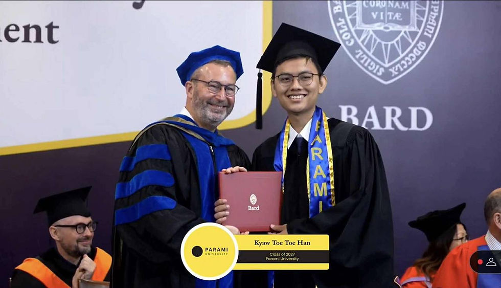 Dr. David Shein presents Bard diploma to Kyaw Toe Toe Han at the 2025 Commencement Ceremony.