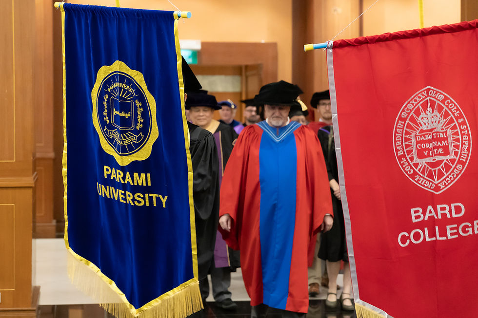 Faculty and student representatives entering the hall during the graduation march