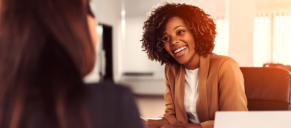 Woman interviewing a young lady