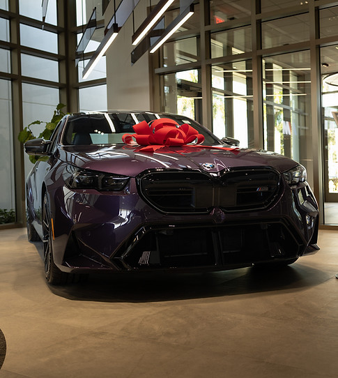 BMW of Naples (BMW M5) 2026 in a beautiful purple