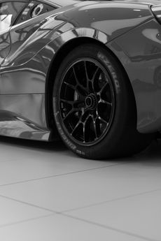 black and white ferrari wheel shot