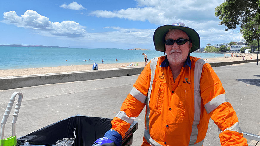 ventia worker pictured in front of waste removal truck