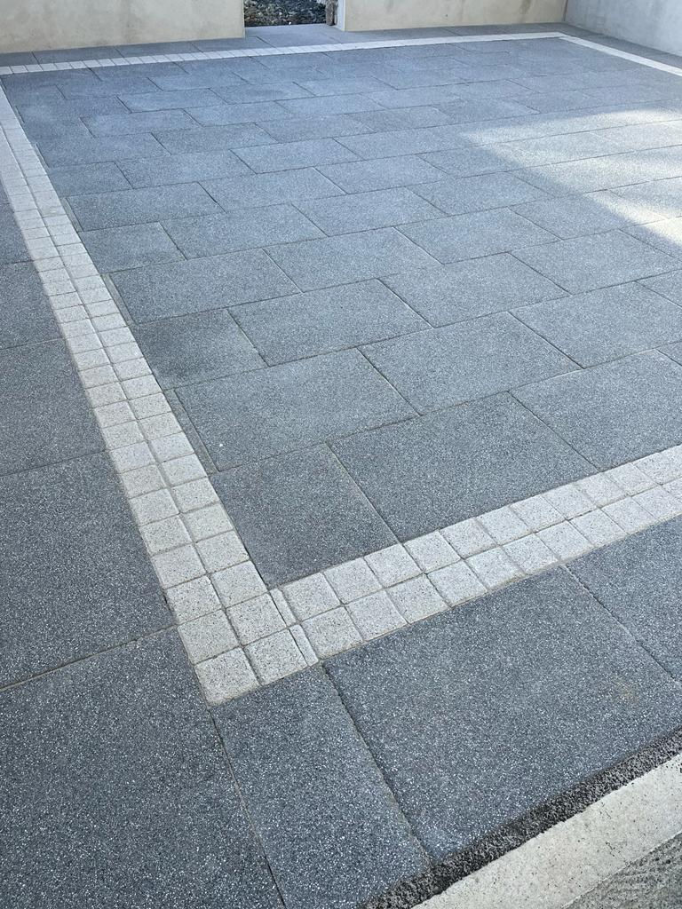 Mayfair Graphite paving flags with Silver Granite cobble border installed in Cavan.