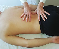 Man receiving Bowen Therapy treatment