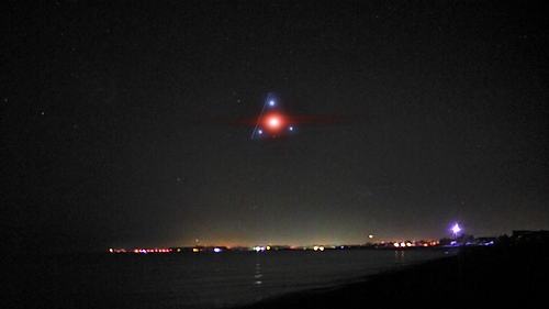TR-3B black triangle UFO Stealthily Cloaked as 3 Stars over the Sea