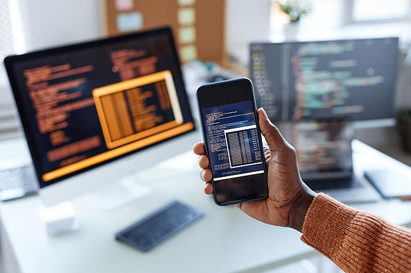 hand-developer-showing-smartphone-with-code-new-app-screen.jpg