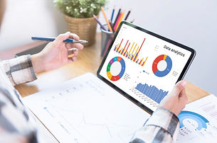 businesswoman-using-tablet-analysis-graph-company-finance-strategy-statistics-success-conc