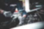 closeup-hand-technician-using-wrench-repairing-car.jpg