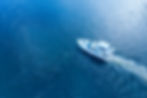 motorboat-racing-through-river-sunlight.jpg
