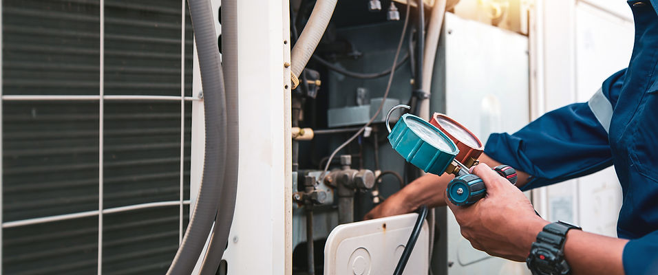 technician-hand-measuring-manifold-gauge-checking-air-conditioner.jpg