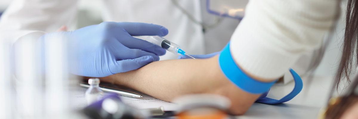 doctor-gives-intravenous-injection-patient-medical-office.jpg
