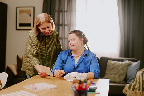 mom-daughter-with-disability-looking-embroidery-pattern.jpg