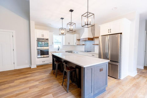 Modern kitchen with large island and stainless steel appliances