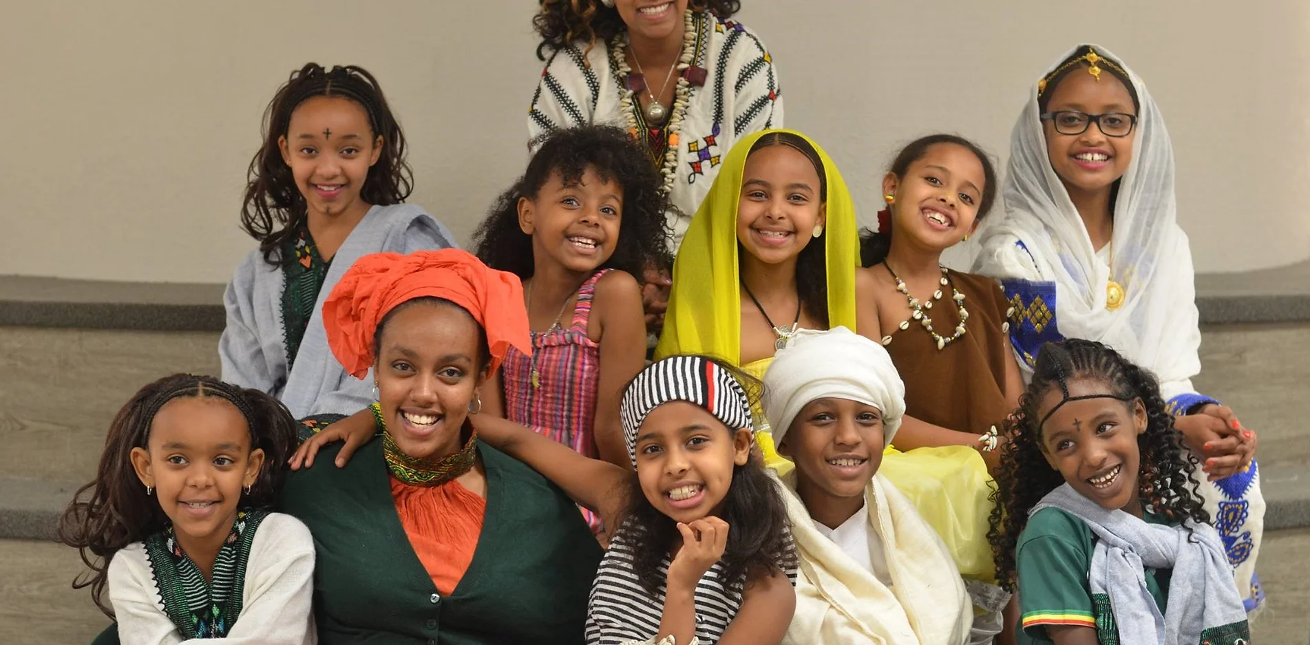 Women and children smiling