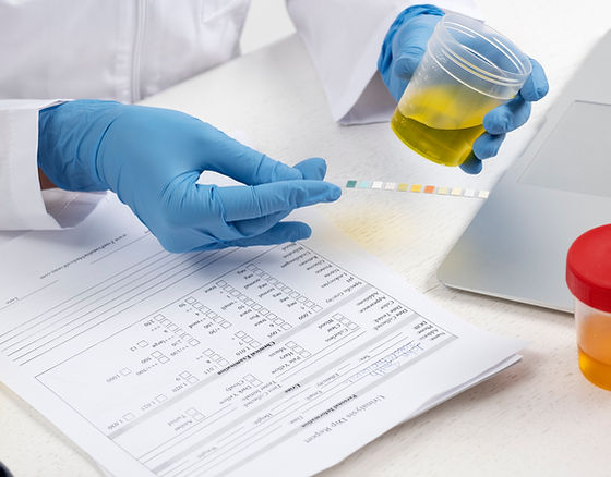 lab-doctor-performing-medical-exam-urine.jpg