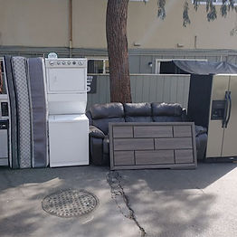 Washer n' dryer and old furniture before haul away