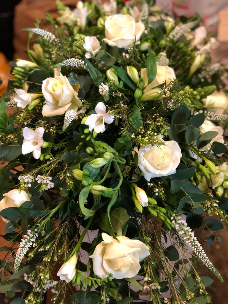 Roses and Freesias in greens and whites