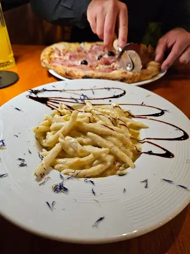 Creamy cheese pasta with arugula at Pizza Pasta Tudors in Split.