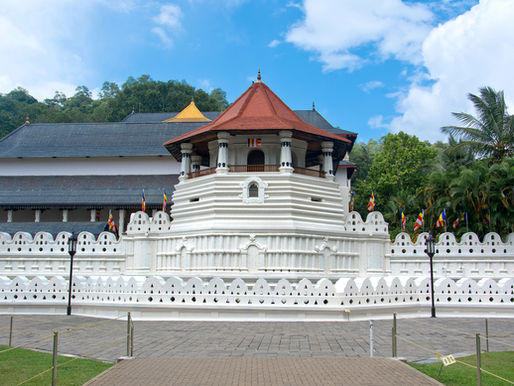 white temple with terracotta roof