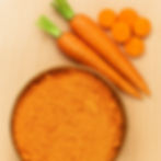 Carrots and beta-carotene powder used in Fooditive’s natural preservatives created through fermentation for clean-label food applications