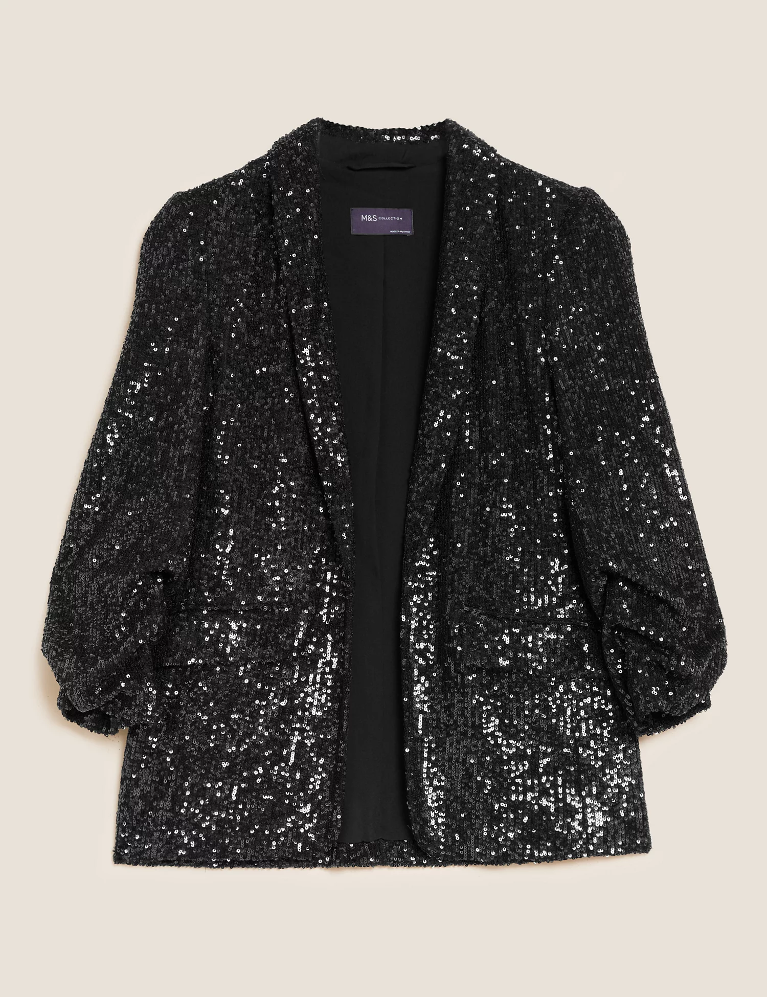 a black sparkling jacket