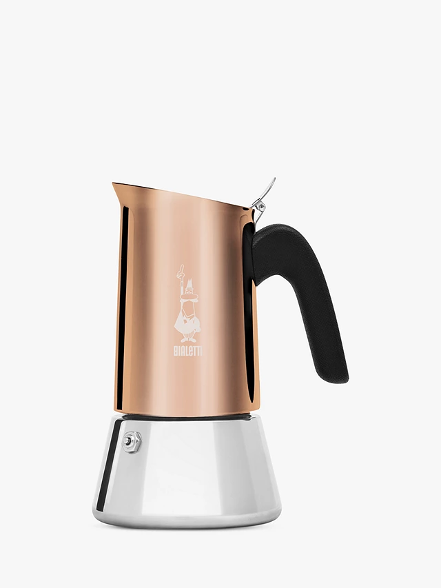 a copper coloured coffee pot