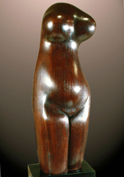 Torse  formes rondes.en teck