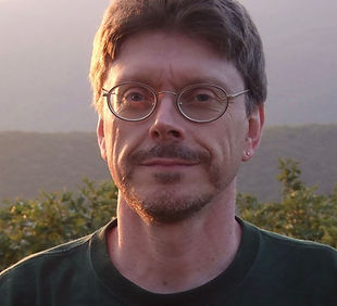 Bill brought his dream of creating a natural burial sanctuary for Cincinnati to fruition in 2020, after more than a decade of hard work that began with an inspiration at the grave of the great 19th century naturalist Henry David Thoreau. He says, “In that moment, I realized that Thoreau had, indeed, become a vital part of the natural world that he so loved – but only because he, like all his contemporaries, had been buried in a way that today we would call ‘green’ burial.” As the Tri-State’s leading spokesperson for green burial, Bill has appeared in numerous local, regional and national publications, as well as in broadcast media, advocating for a return to more natural and traditional human burial practices. He has long been active in the “Death Positive” movement, is a Friend of the Green Burial Council, and is a member of the National Home Funeral Alliance. Bill has also served as minister of the Heritage Universalist Unitarian Church in Anderson Township since 2002.