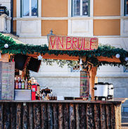 vin brule wooden sign in trento christmas market