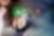 Businesswoman pressing smiley face emoticon on virtual touch screen. Customer service eval