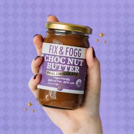 Choc Nut Butter and hand