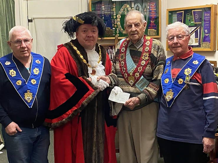 Mayor of Patchway Cllr Dayley Lawrence receiving a donation from The Royal Antediluvian Order of Buf