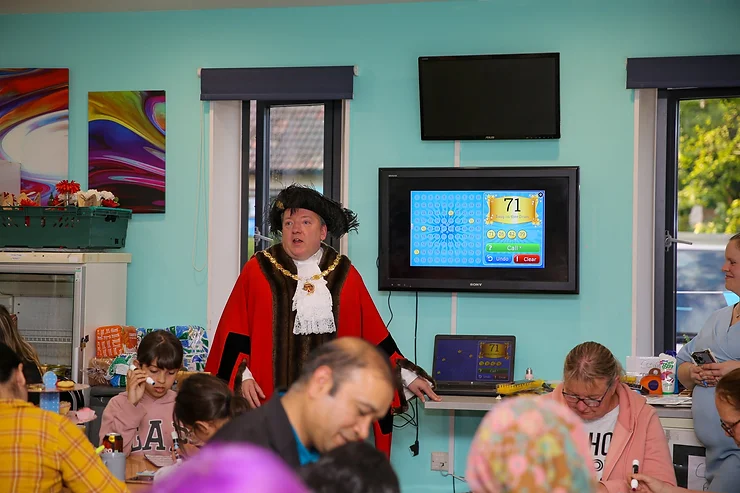 Mayor Cllr Dayley Lawrence calls out the bingo numbers at the Platinum Jubilee Bingo Night