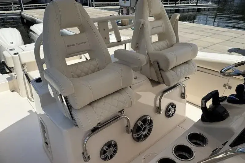 Eye-level view of the helm and console seating on a Grady-White Canyon 306.