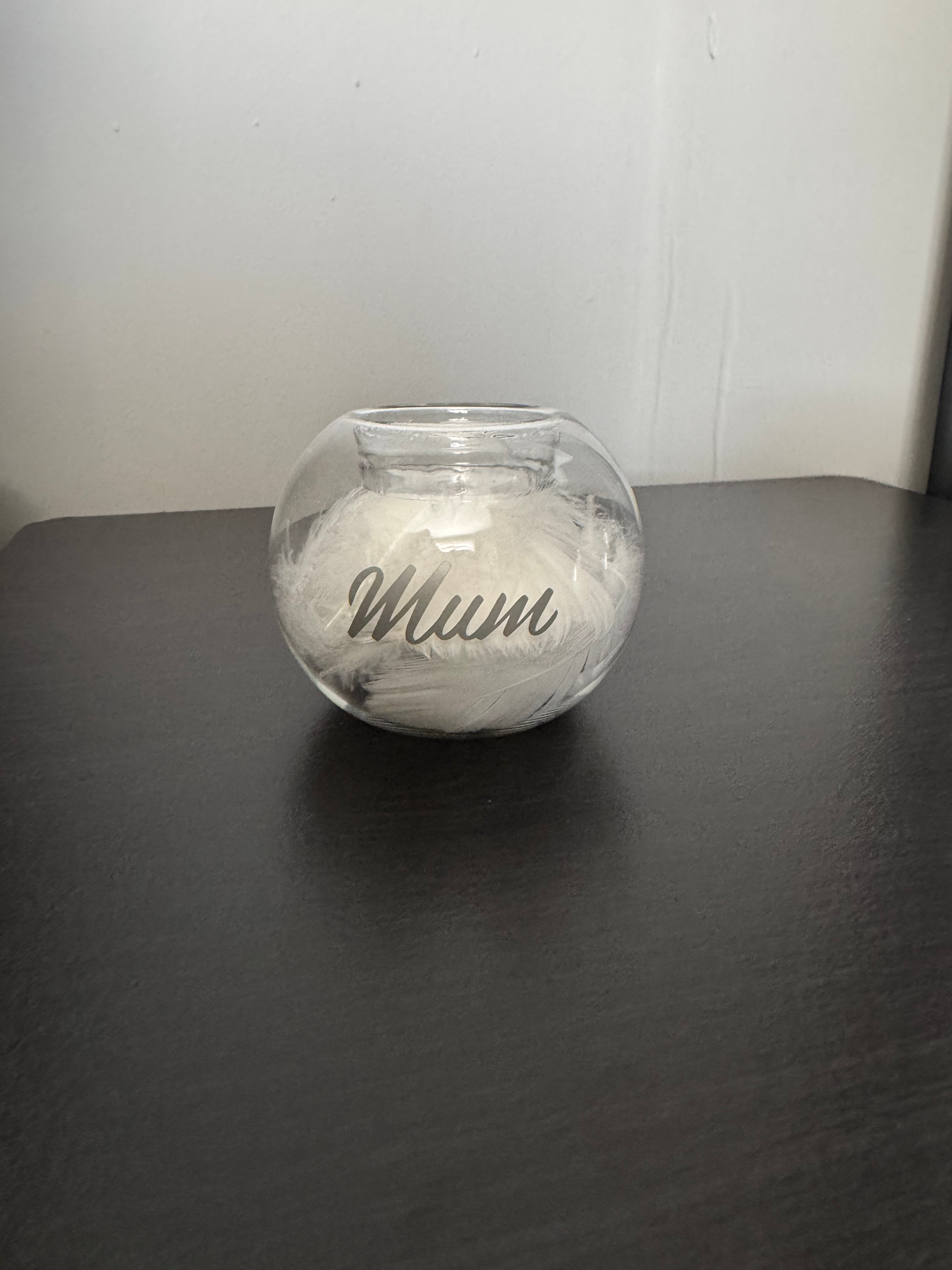 Personalised feather filled tea light holder