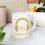Thumbnail: SayIntentions.AI Gold Logo White Ceramic Mug,