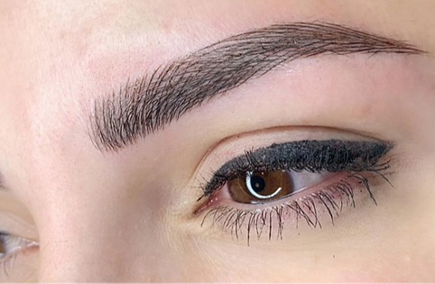 hyper-realistic hairstrokes with microblading treatment close up photo